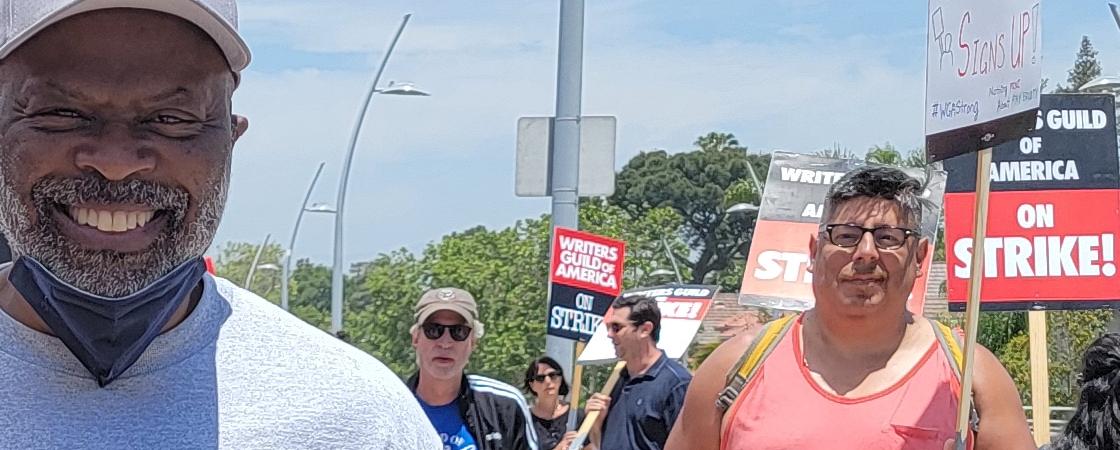 728 Sgt at Arms Robin Strickland marches in solidarity with WGA