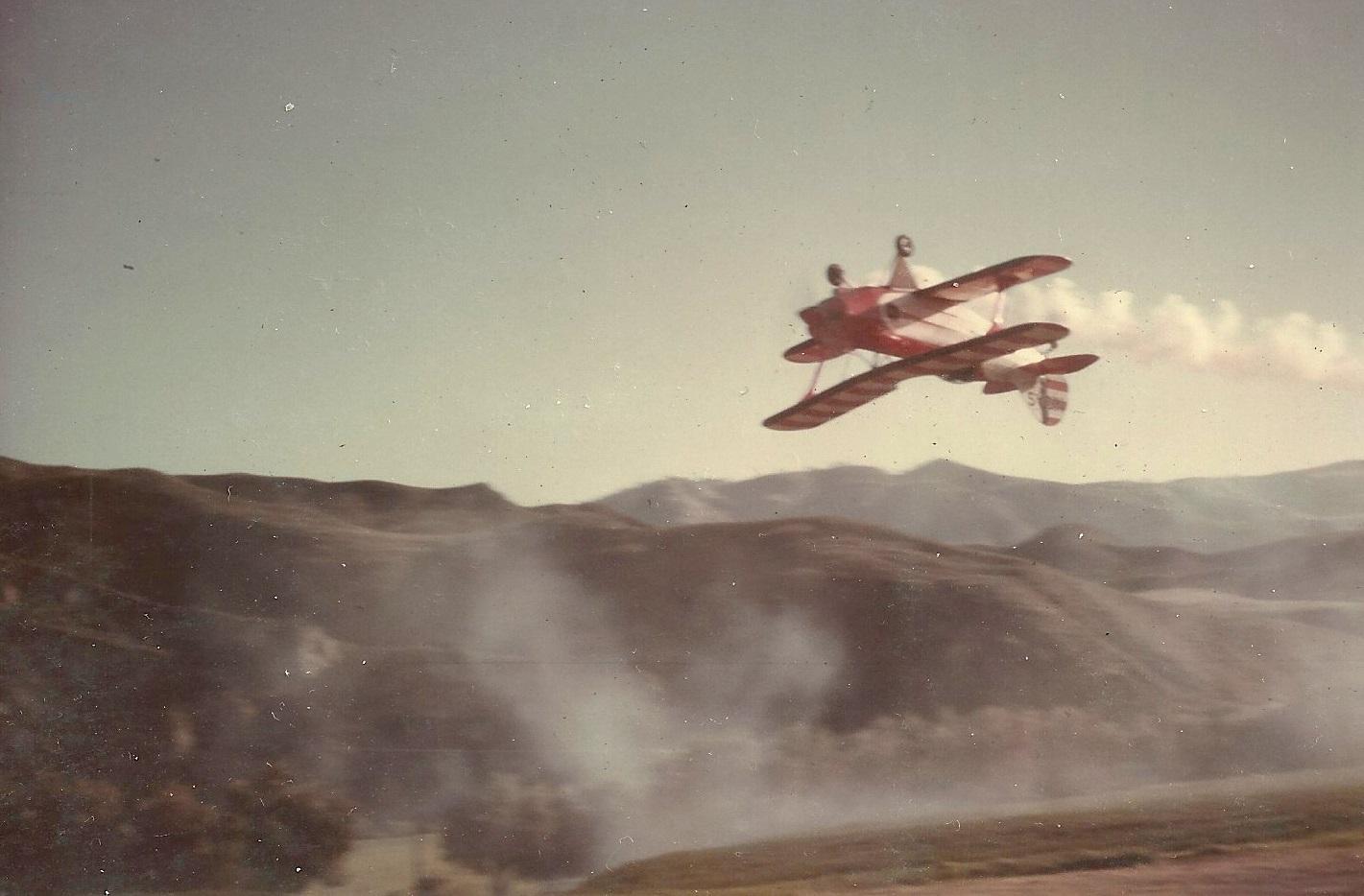 Bi-Plane performing stunt